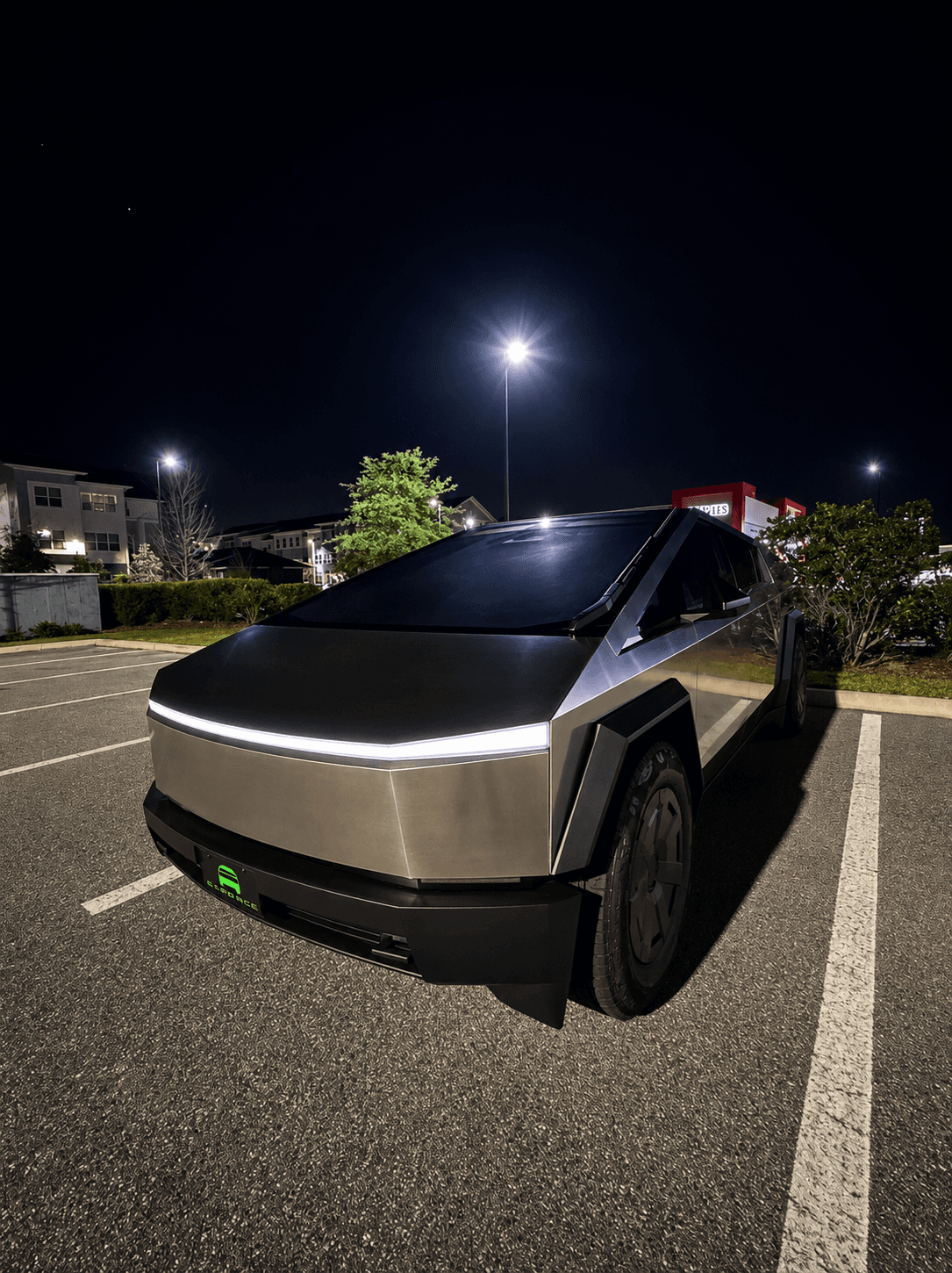 G-Force Ridez Cybertruck — silver factory finish parked at night